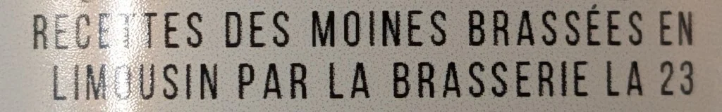 Mention sur une étiquette indiquant « Recettes des moines brassées en Limousin par la Brasserie La 23 ».